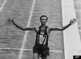 Abebe Bikila wins the Olympic marathon in Tokyo in 1964.