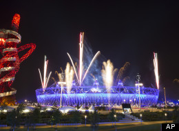 Fireworks explode over the Olympic Stadium during a rehearsal for the opening ceremony at the 2012 Summer Olympics, Wednesday, July 25, 2012, in London.
