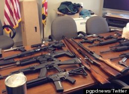 Police displayed some of the weapons seized from the suspect in an alleged shooting plot in Maryland.