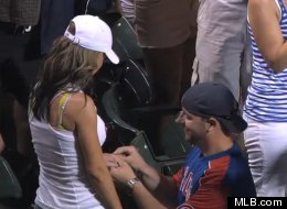 Erica accepts Greg's marriage proposal at a Cubs game Monday.