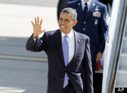 President Barack Obama arrives at John F. Kennedy International Airport, July 30, in New York. (AP Photo/Jason DeCrow)