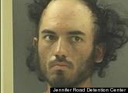 Kyle Nolan Tanner, above, pretended to point a gun at the audience of