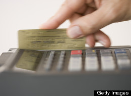 U.S. consumers cut back on credit card use in June, proving that more people are being cautious about spending.