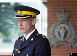 RCMP Insp. Garrett Woolsey addresses a news conference in Calgary, Alta., Saturday, Aug. 11, 2012 where he announced that RCMP in southern Alberta have charged a man with murder in connection with the death of a retired Mountie who was working as a peace officer. THE CANADIAN PRESS/Larry MacDougal