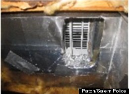 Police say that Christian Hobbs, 47, hid beneath a woman's trailer for days.