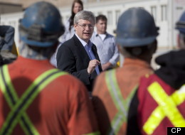 Canadian Prime Minister Stephen Harper delivers a speech at a copper mine in Minto, Yukon, Tuesday August 21, 2012. (CP/Adrian Wyld)