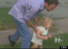 Kelly Davis plays with 2-year-old daughter Myla.