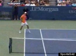 Bob Bryan returns a ball from Santiago Gonzalez between his legs during a third round match at the 2012 US Open in Flushing.