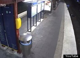 Surveillance footage shows a man falling into the subway tracks, then an unknown individual allegedly robbing him.