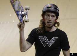 Olympian Shaun White waves to the crowd after skateboarding at the Dew Tour Wendy's Invitational Thursday, Aug. 12, 2010, at the Rose Quarter, in Portland, Ore. White from Thursday's skate vert prelims advanced to Sunday's final round at the Rose Garden Arena. (AP Photo/Rick Bowmer)