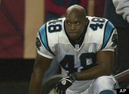 Carolina Panthers running back Stephen Davis looks on from the sidelines as the Atlanta Falcons beat the Panthers in overtime 20-14 at the Georgia Dome in Atlanta Sunday, Dec. 7, 2003. (AP Photo/Ric Feld)