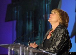 Globe and Mail columnist Margaret Wente accepts her National Newspaper Award for columns in Calgary on Friday, April, 26, 2002. After days of mounting pressure from readers and industry experts, <em>The Globe and Mail</em>, one of Canada’s largest newspapers, has clarified its response to plagiarism allegations swirling around Wente. (CP PHOTO/Jeff McIntosh)