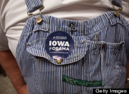 Jerry Nagel shows off an Obama support sticker while voting early at the Black Hawk County Courthouse on Sept. 27, 2012 in Waterloo, Iowa. Early voting starts today in Iowa, where in the 2008 election 36 percent of voters cast an early ballot. (Photo by Scott Olson/Getty Images)