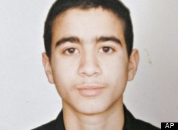 Convicted war criminal Omar Khadr has returned to Canada, Public Safety Minister Vic Toews confirmed Saturday morning. (AP File Photo)