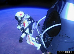 In this photo provided by Red Bull Stratos, skydiver Felix Baumgartner of Austria steps into the history books. In a giant leap from more than 24 miles up, the daredevil shattered the sound barrier Sunday while making the highest jump ever – a tumbling, death-defying plunge from a balloon to a safe landing in the New Mexico desert. (Red Bull)