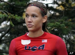 Olympic hurdler Lolo Jones waits for her run at the U.S. women's bobsled push championships on Friday, Oct. 5, 2012, in Lake Placid, N.Y.