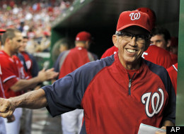In this Sept. 1, 2012,, file photo, Washington Nationals manager Davey Johnson smiles in the dugout during a baseball game against the St. Louis Cardinals at Nationals Park in Washington.