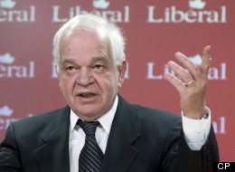 Liberal MP John McCallum gestures during a news conference about upcoming government cuts in Ottawa, Thursday Feb.23, 2012. (THE CANADIAN PRESS/Adrian Wyld)