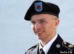 U.S. Army Private Bradley Manning is escorted as he leaves a military court at the end of the first of a three-day motion hearing June 6, 2012 in Fort Meade, Maryland. (Photo by Alex Wong/Getty Images)