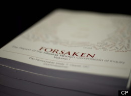 The report on the findings of the Missing Women Commission is seen during a news conference in Vancouver, B.C., on Monday, December, 17, 2012. (THE CANADIAN PRESS/Jonathan Hayward)