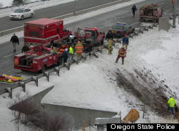 Emergency crews respond to a tour bus crash along an icy Oregon highway. (Oregon State Police)