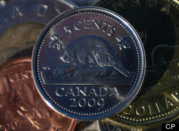 As the penny is set to begin retirement next month, there are already calls to put the nickel out to pasture as well. (THE CANADIAN PRESS/Sean Kilpatrick)