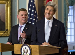 Secretary of State John Kerry, right, speaks with reporters during a news conference with Canadian Foreign Minister John Baird, Friday, Feb. 8, 2013, at the State Department in Washington. (AP Photo/J. Scott Applewhite)