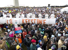 Protestors gather at the National Mall in Washington calling on President Barack Obama to reject the Keystone XL oil pipeline from Canada, as well as act to limit carbon pollution from power plants and “move beyond” coal and natural gas, Sunday, Feb. 17, 2013. (AP Photo/Manuel Balce Ceneta)