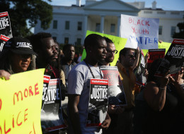 Activists brought over 900,000 petitions to the White House gates on Thursday. (Alex Wong/Getty Images)